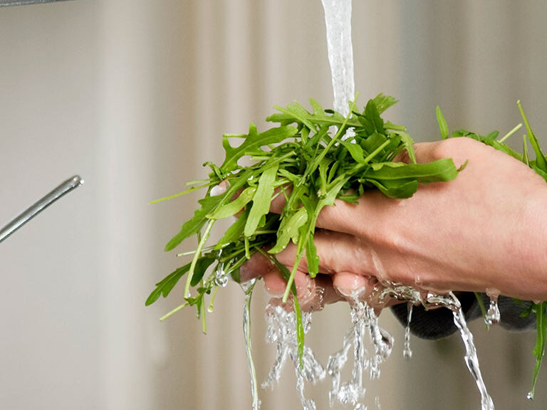 Cleaning vegetable with water