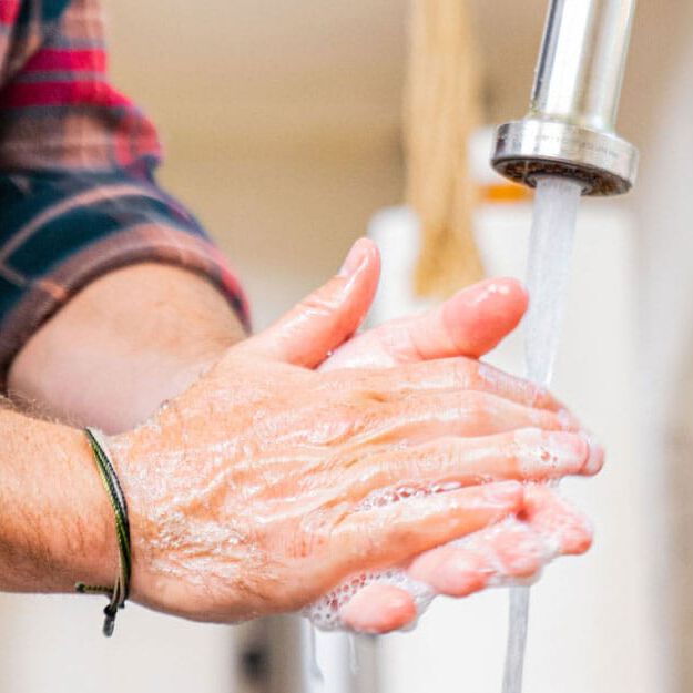 man washing hands