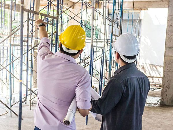 Builders on a construction site Builders on a construction site