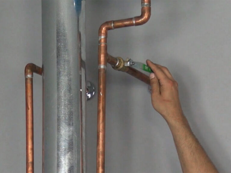 Opening plumbing valve to let water into tank
