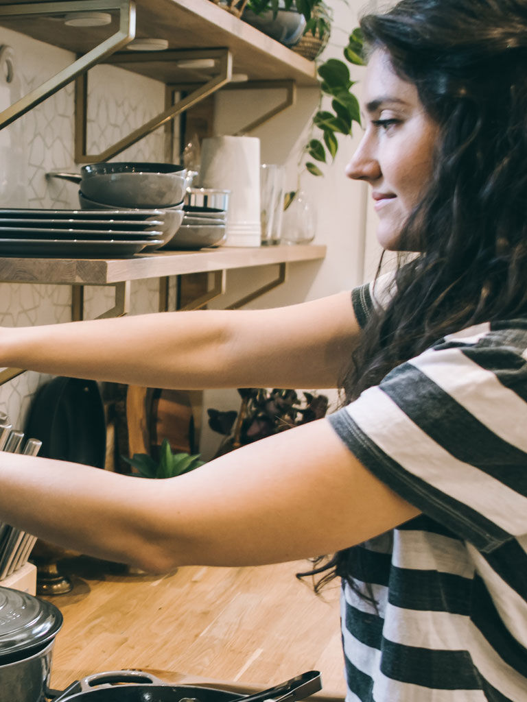 woman trimming plant woman trimming plant