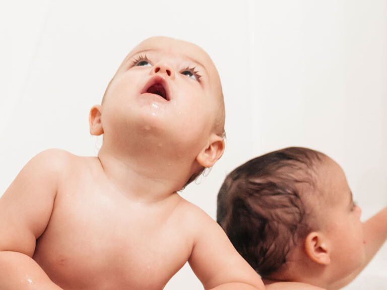 babies in bath tub