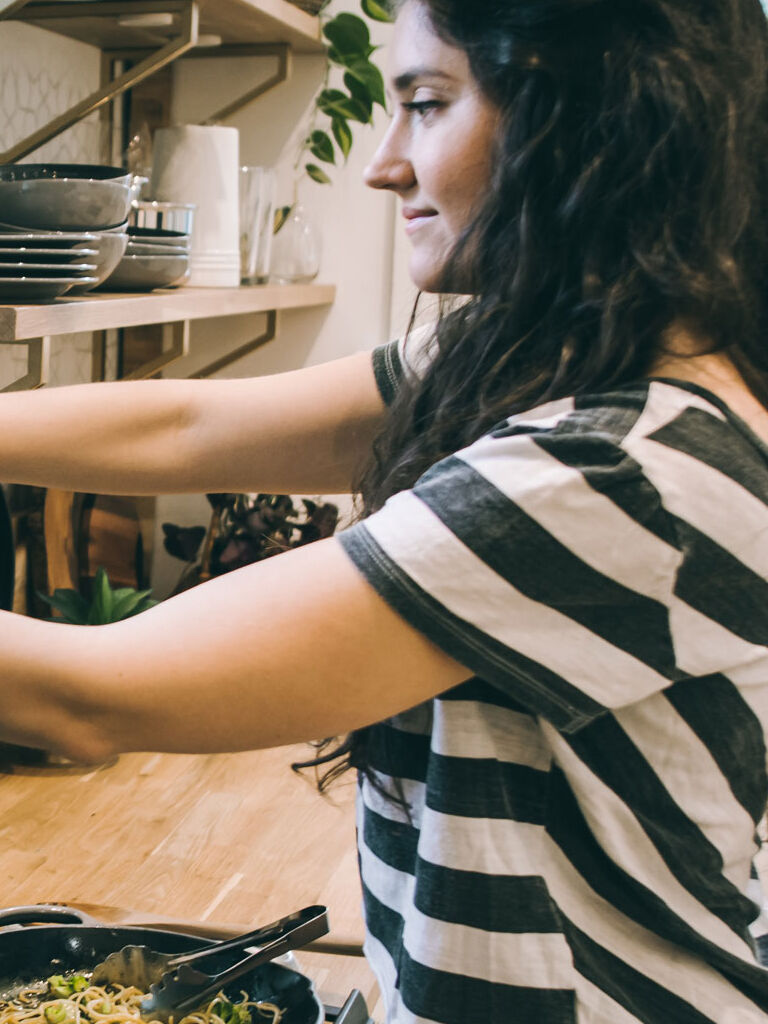 woman trimming plant woman trimming plant