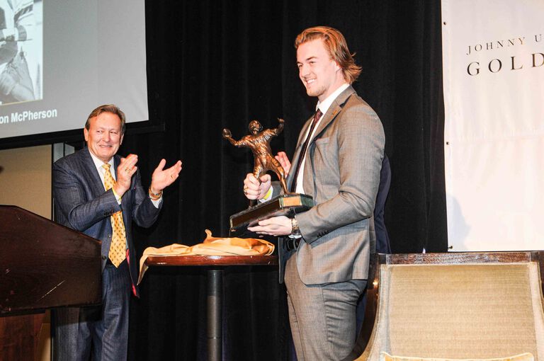 Kenny Pickett receiving Johnny Unitas Golden Arm award
